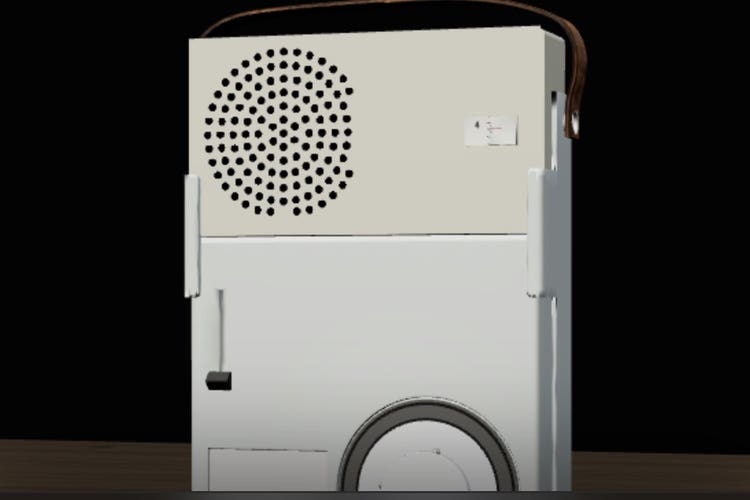 The Braun TP1 portable radio-phonograph on a desk